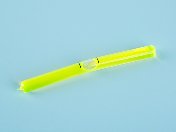 Fluorescent glass tubular bubble level with a single tip