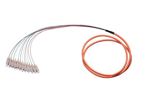An orange fiber pigtail on white background.