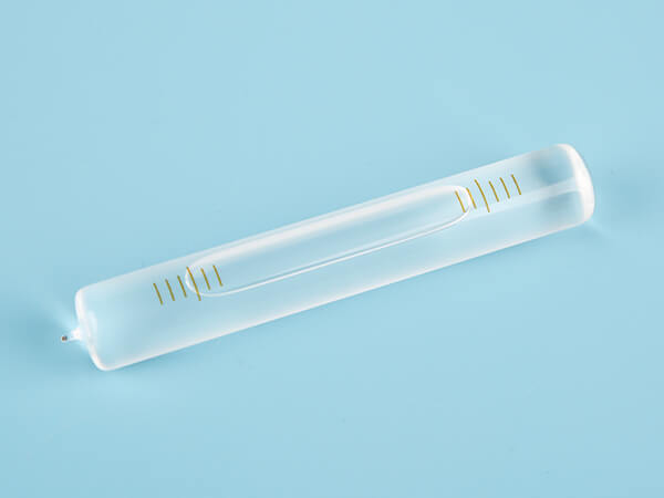 Glass tubular bubble level with scales on a frosted surface with a single tip