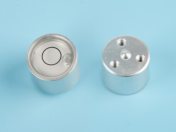 2 metal bullseye level bubbles on the front and back views