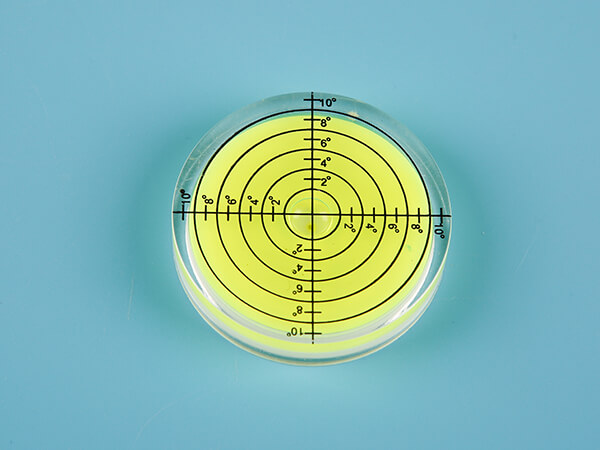A plastic bullseye level vial